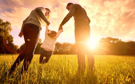 A mother and Father with a child