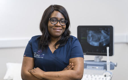 Dr Adeola with scan