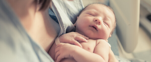 woman holding baby