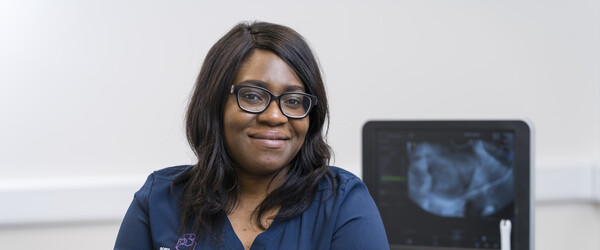 Dr Adeola with scan