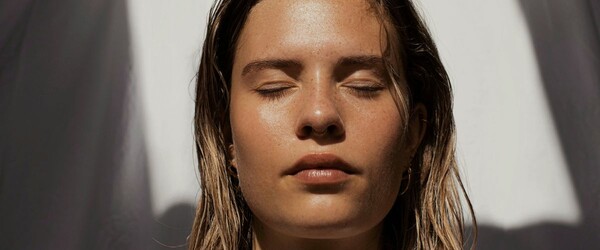 Girl with eyes closed