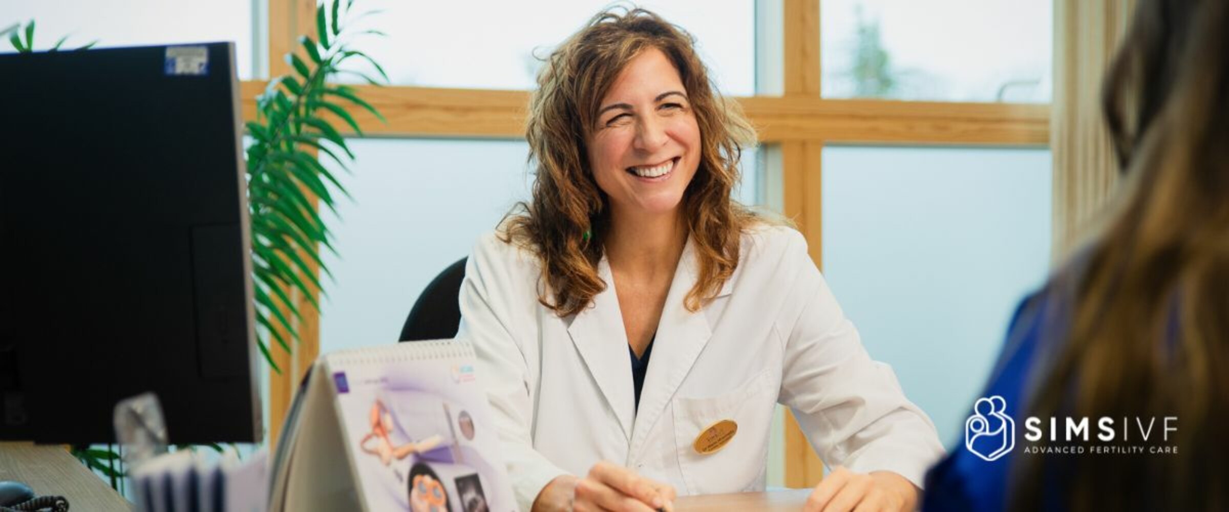 Dr Marta having a consultation with a patient.